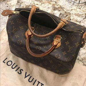 Louis Vuitton purse. $600 OBO